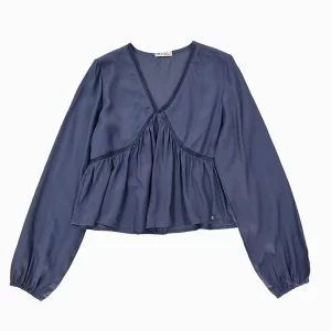 Blusa azul escote pico y amplia en el bajo, con intersecciones en costuras frontales y cuello. 100% Viscosa